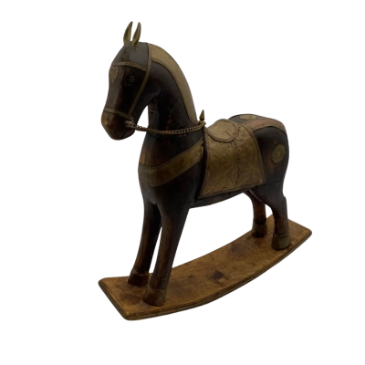 Antique wooden rocking horse with hammered copper and brass inlay