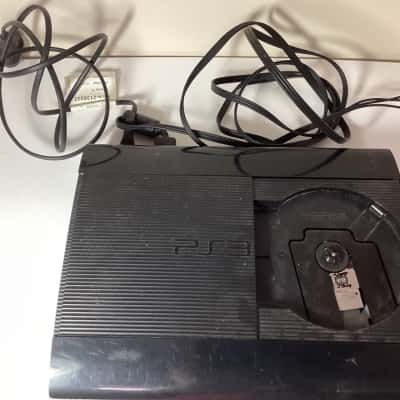 Sony PlayStation 3 (PS3) Super Slim Bundle - 8 Games & 3 Controllers