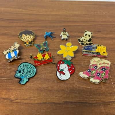 Collection of 12 lapel pins