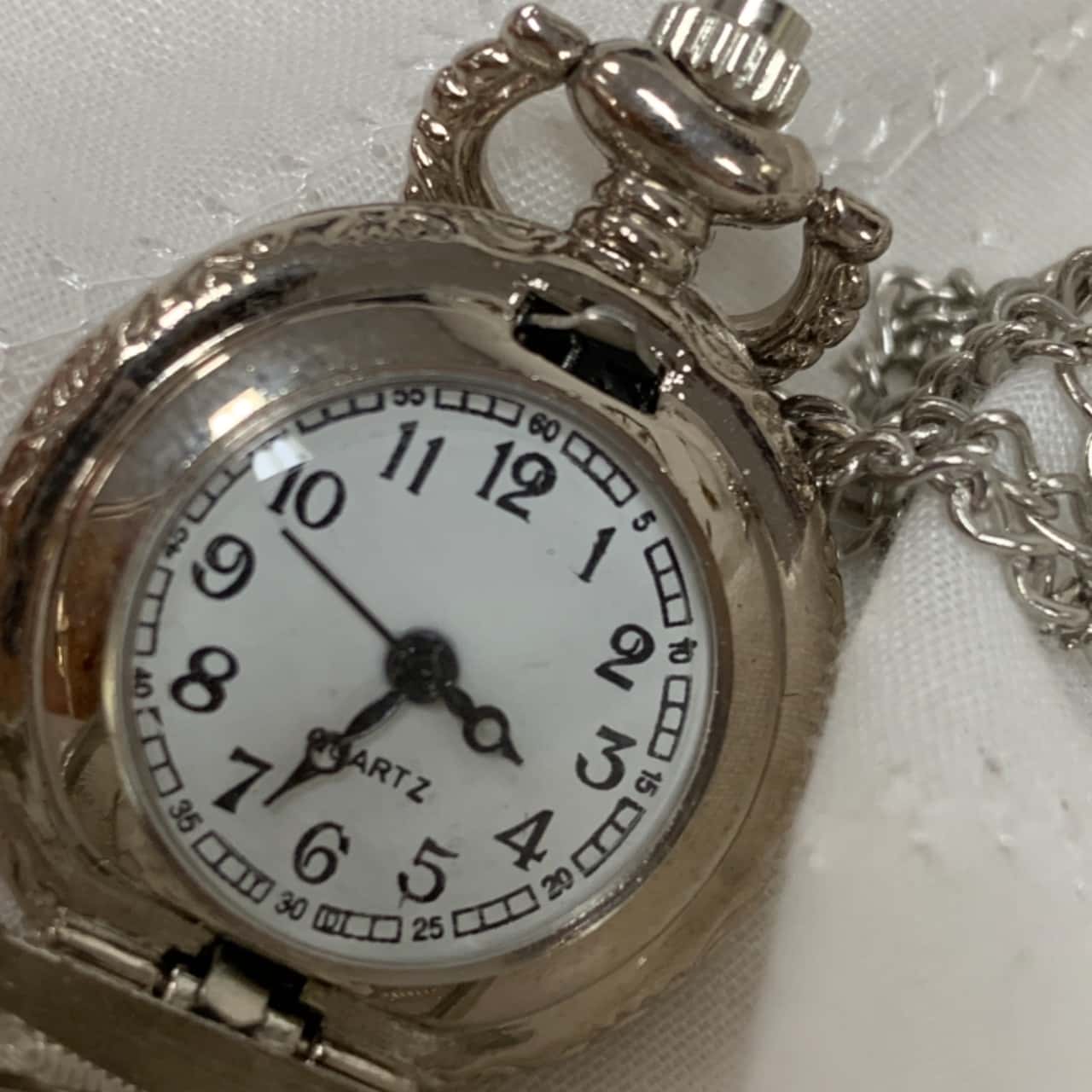 Decorative mini silver quartz pocket watch on chain (s)