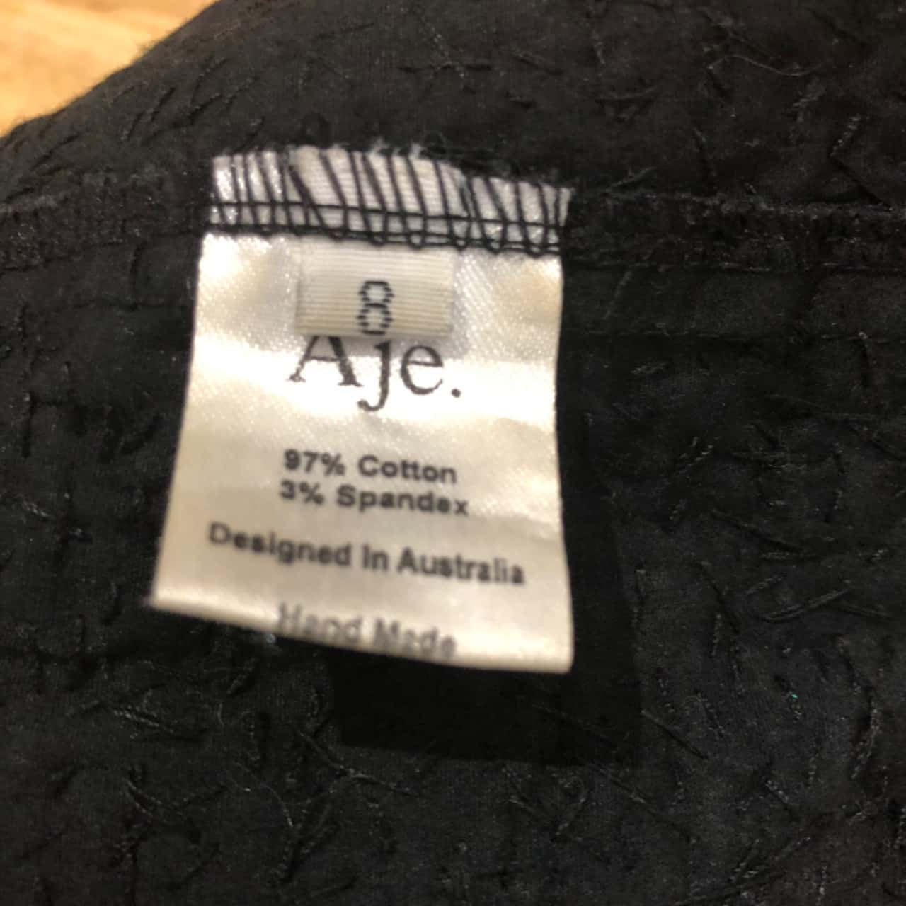 AJE Size 8 Mini Black Sequin(s)