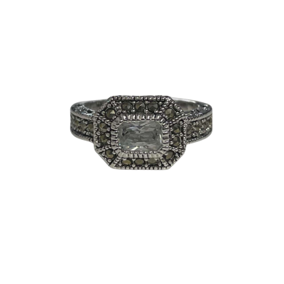 Pretty silver coloured dress ring with a central emerald cut stone surrounded by smaller stones