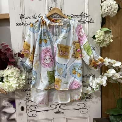 KIIK LUXE BRAND! Womens  Size S/M Button Up Top Multicoloured / Pattern! LINEN BLEND! BEAUTIFUL COLOURFUL DESIGN! LACE DETAILING NEAR BUTTONS! BALLOON SLEEVES AND HIGH LOW CUT! BNWT
