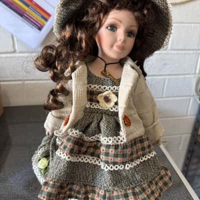 The Beaurington Collection, collectible porcelain doll,with a porcelain head, hands, and feet (B11)