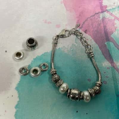 Silver charm bracelet with extra charms - please read description 