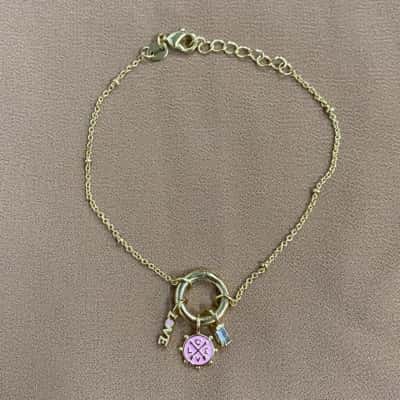  Womens YGI China Gold Tone Charm Bracelet with Pink Accent
