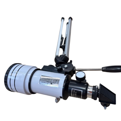 small refractor telescope on an aluminium tripod 