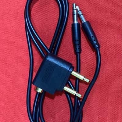 Aux cord with twin jack adapter