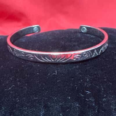  Women's Silver Tone Cuff Bracelet featuring Engraved  Pattern