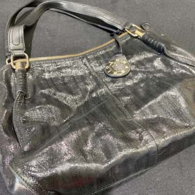 Philippe Charriol large black colour bag with shinny look leather  