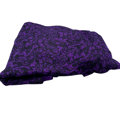 Stretch man made fabric.  108 (w) x 210 (L) Purple and black pattern of faces.  