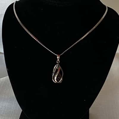  926 Silver Necklace and Pendant with stone or crystal inside cage 