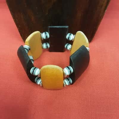 Handcrafted stretch wooden beaded bracelet featuring a natural design