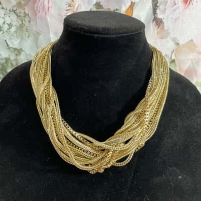Multiple Strand Gold Toned Necklace 