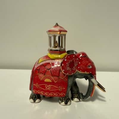Vintage ceramic ambabari elephant figurine