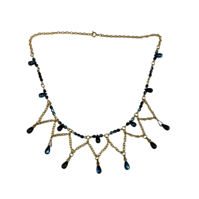 Gold Toned Necklace with Blue Teardrop Beads.