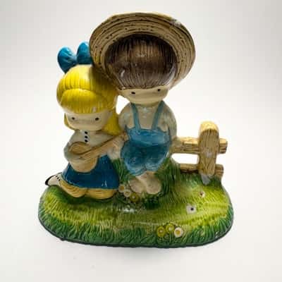 Vtg. 1972 Joan Walsh Anglund ceramic figurine titled "Gather Songs The Robins Bring" or "Daisy Days"