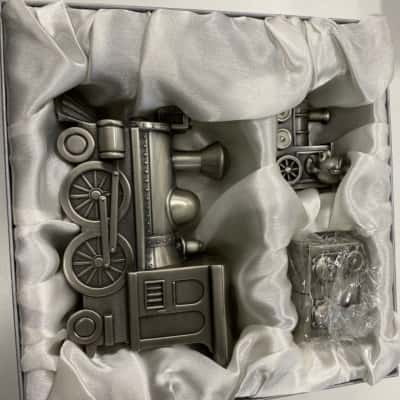 Silver plated trains with bears 