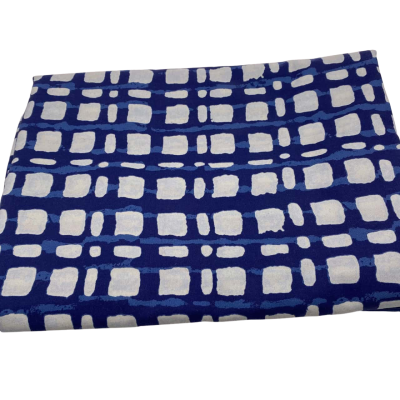 Man made fibre.  114 (w) x 300 (l) cm approx.  Blue block pattern.