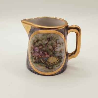 Monarch Porcelaine d'Art - Limoges. France. Mini Creamer with a Victorian Scene.