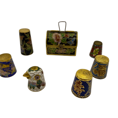 Cloisonné thimbles (6) and mini chest