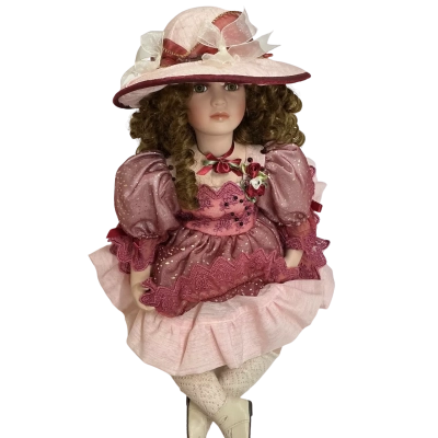Vintage style porcelain doll with hat