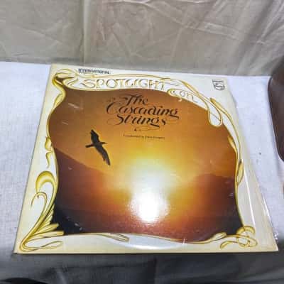 collectible vinyl record titled "Spotlight On The Cascading Strings" by The Cascading Strings. 