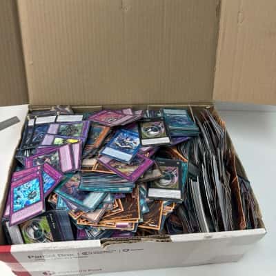 7kg of YU GI OH cards unchecked in box