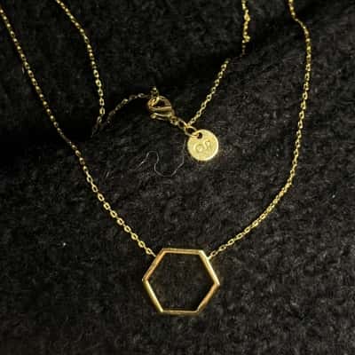 Gold Tone Country Road Hexagon Necklace