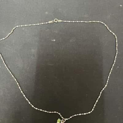 silver necklace with rabbit pendant