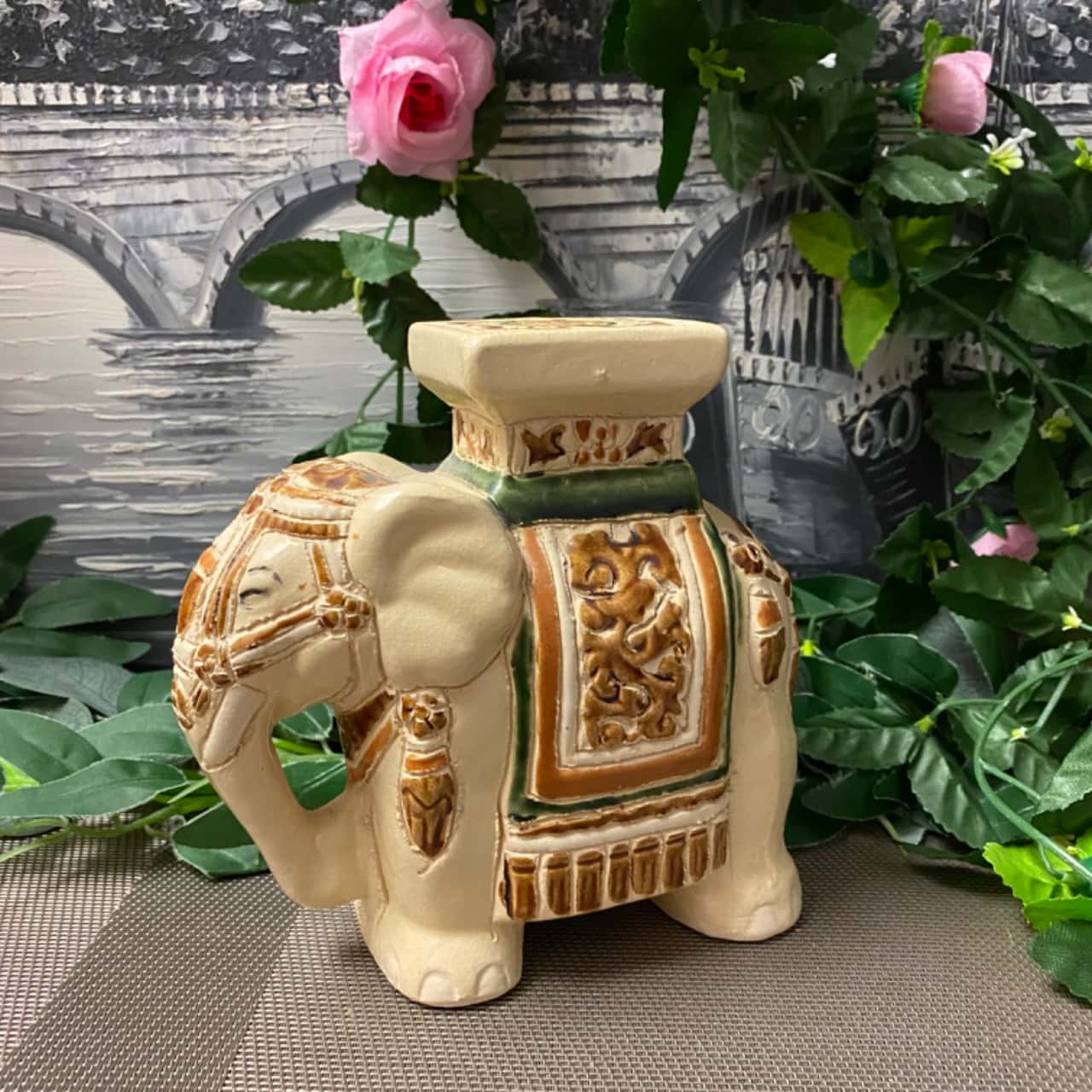Ceramic elephant statue (s)