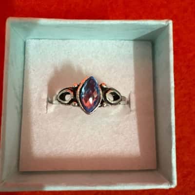  Women's Silver Tone Ring featuring a Light Blue Gemstone