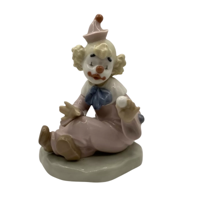 Nao  - Seated Clown figure " now you see it "