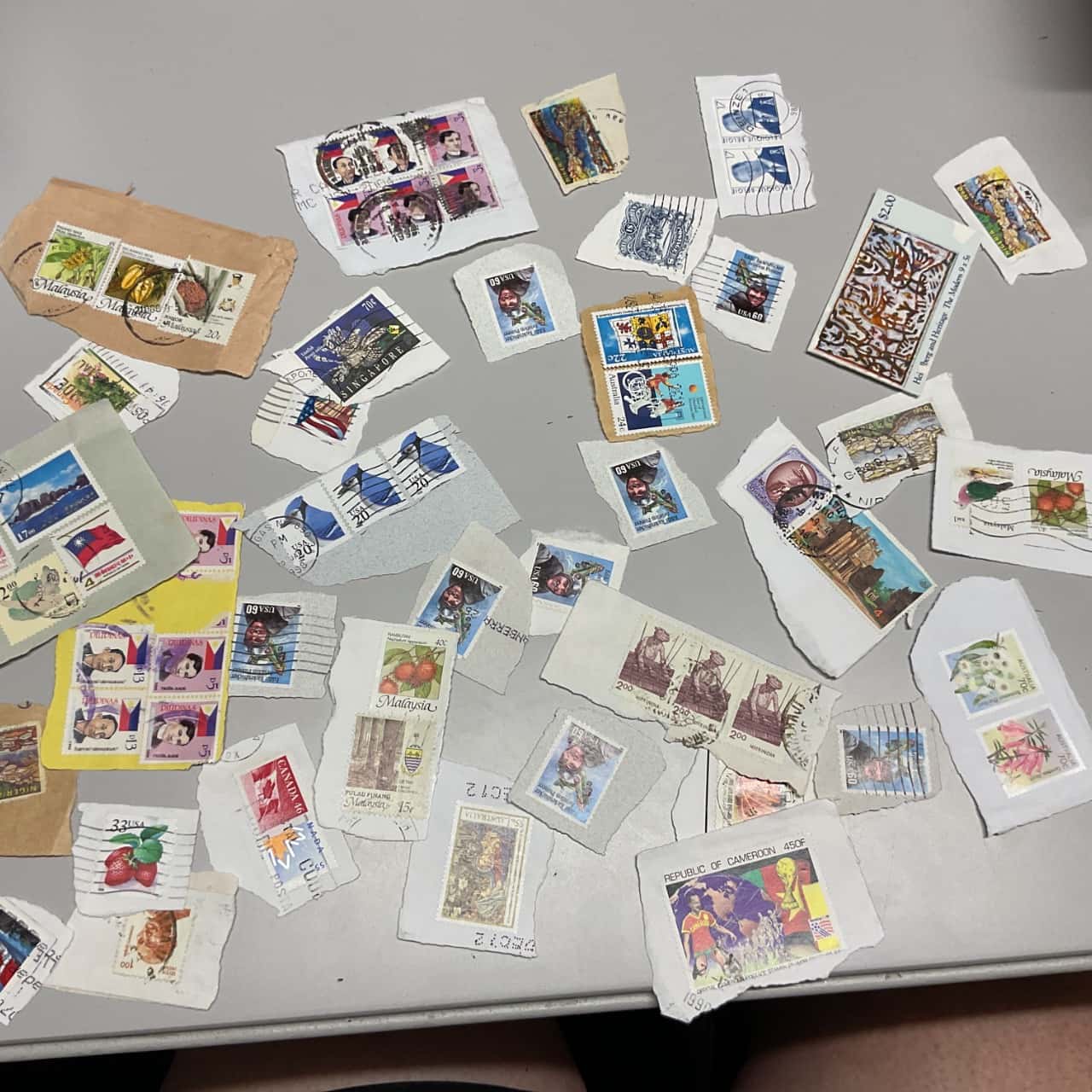 Assorted stamp covers 1 x dinosaurs stamp book with stamps and loose ...