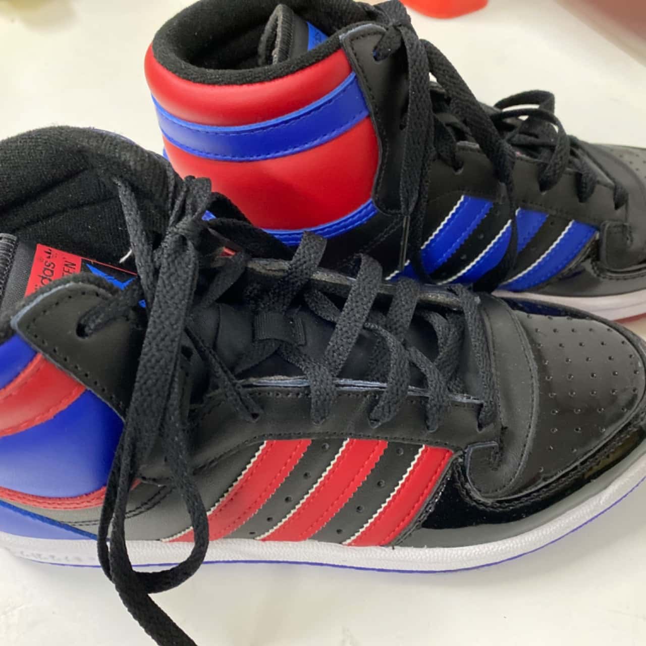 adidas black blue and red shoes