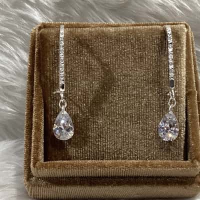  Womens Earrings in Silver & with clear stones.