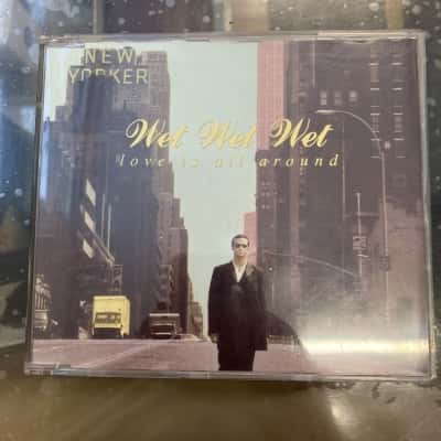 Wet wet wet love is all around 