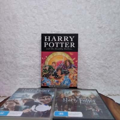 First Edition - Harry Potter: And the Deathly Hallows by J. K. Rowling Hardcover with bonus matching dvds