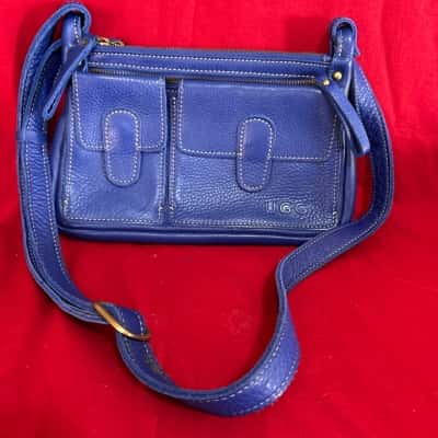 UGG Women’s Shoulder Bag featuring Front Utility Pockets with Flap Closure, Front &  Back Zipper Pockets 