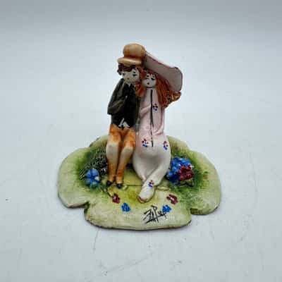 Pastel Ceramica Italy Couple On A Log Figure 