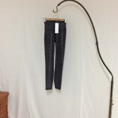 Allfenix  Women's  Size XS Leggings Black  / Pattern / White 