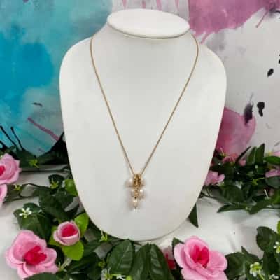 Gold tone long necklace with real pearls 
