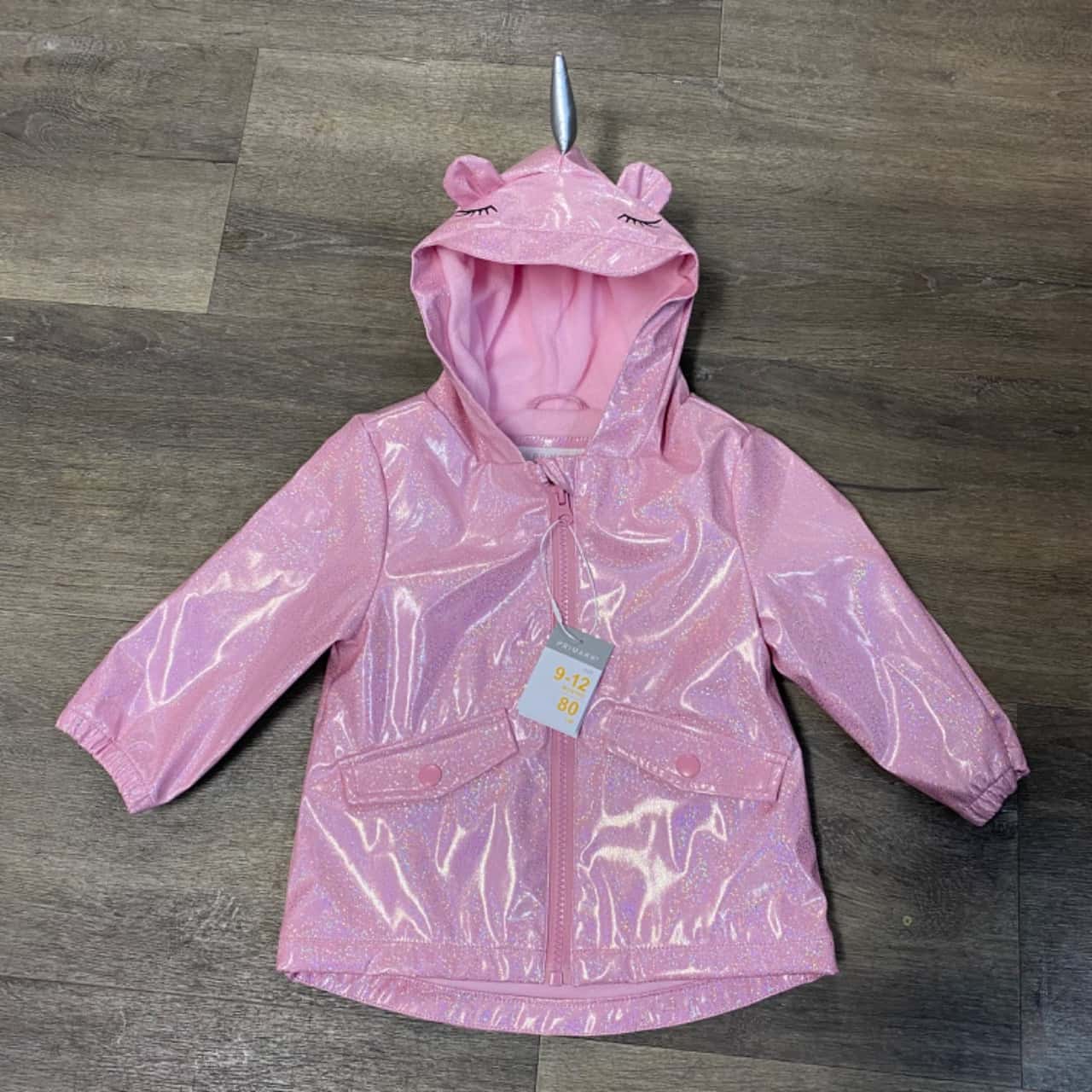 Primark pink raincoat store