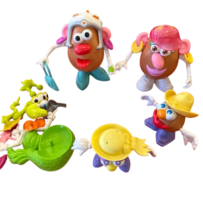 Mr and Mrs Potato Head x4 with spare parts 