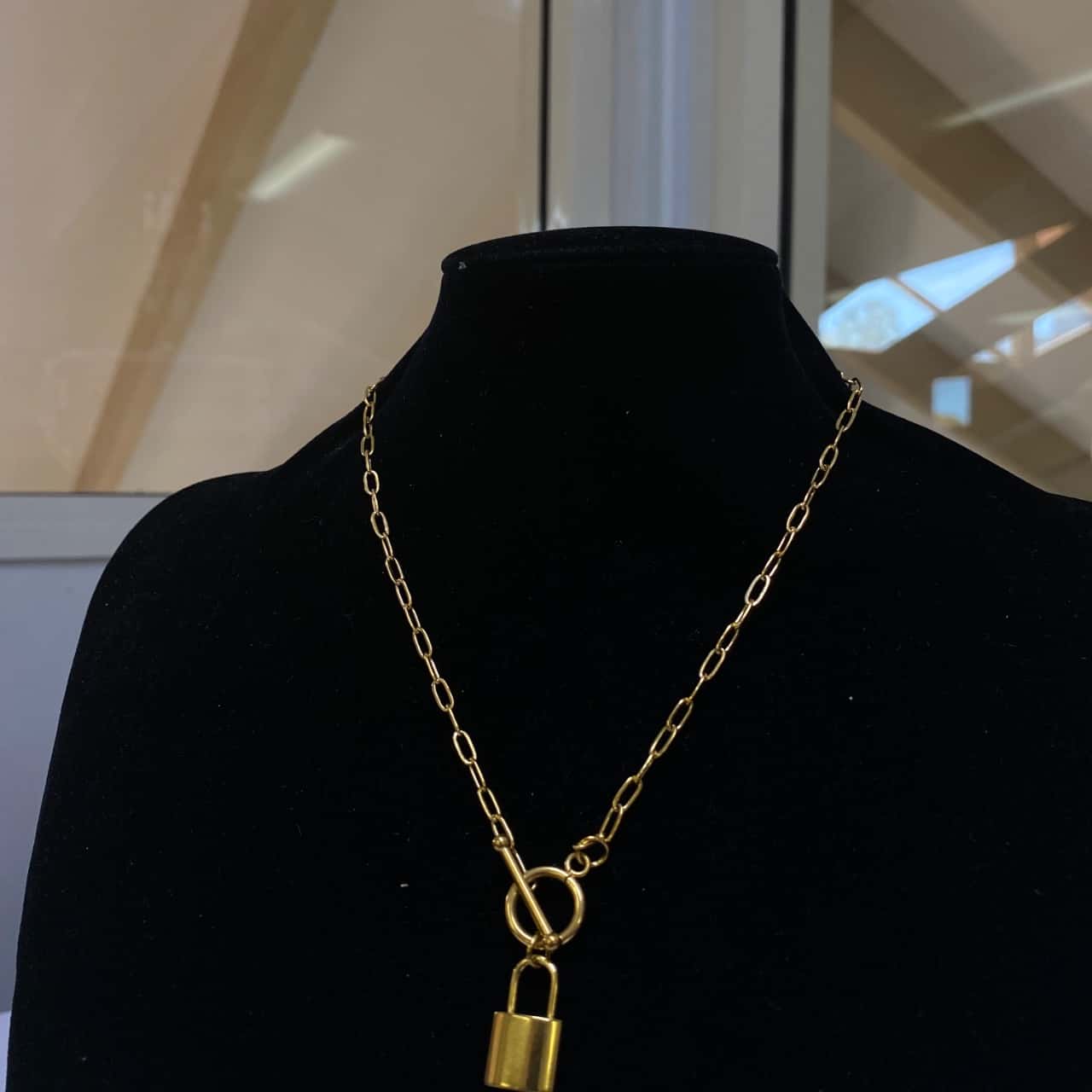 Womens gold locket necklace (s)