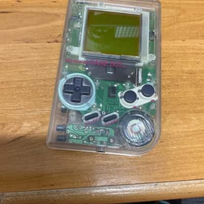 Nintendo Gameboy Clear with 3 games and black carry case. 