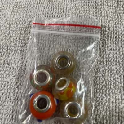  Womens 5 assorted orange and silver beads 