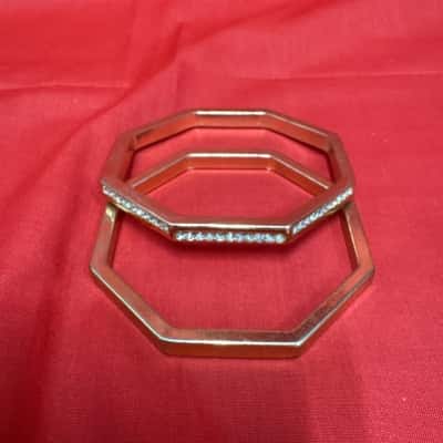  Women's Set of 2 Gold Tone Octagonal Bangles 1 featuring a Single Row of Embedded Rhinestones