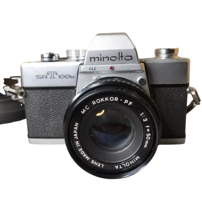 Minolta Film Camera SRT 100b 35mm SLR, with a Minolta Lens MC Rokkor 1:2 f=50mm 