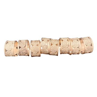 8 matching Silvertone Napkin Rings with Rose Pattern